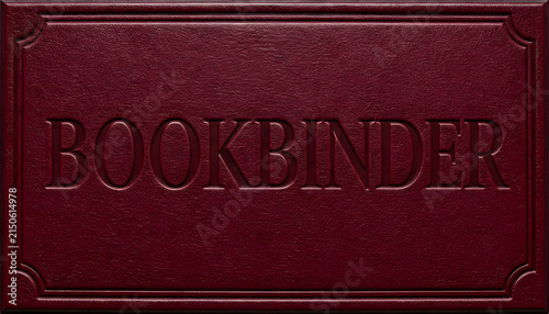 Embossed burgundy leather panel with Bookbinder text