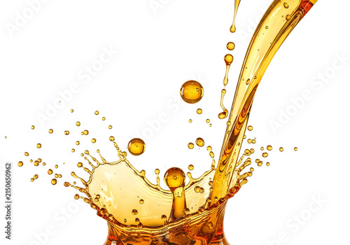 Captivating splash of golden liquid in mid-air with vibrant droplets
