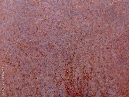 Close-up texture of heavily rusted iron surface background