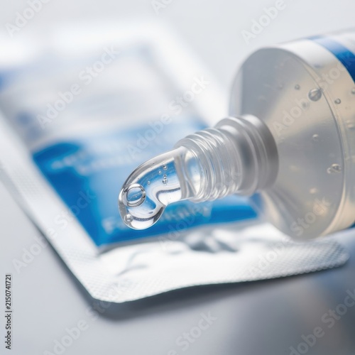 Sterile surgical lubricant dispensed from a clear plastic tube onto its medical packaging