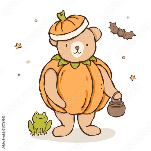 a teddy bear dressed as a pumpkin with a frog