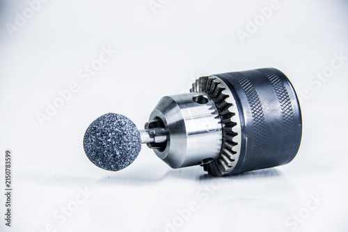 Steel Drill chuck head 13 mm, maintenance electric tools, accessory gear, studio photography shot, isolated on white background, photo is selective focus, shallow depth of field, taken at Cairo Egypt