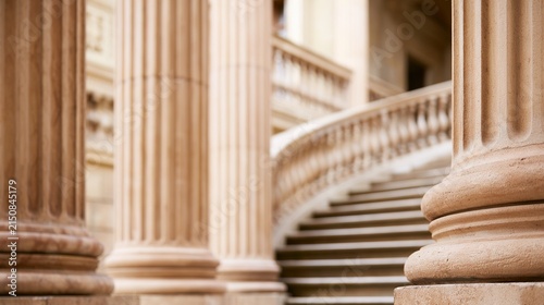 classical. Elegant stone pillars and stairs showcase classical architecture under soft natural light. real-estate listings.