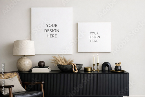 Interior view of a living room with a modern wall gallery featuring black and white canvas prints.
