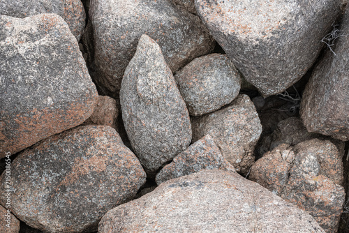 Natural rock texture showing detailed surface patterns and mineral colours, photographed in Western Australia.