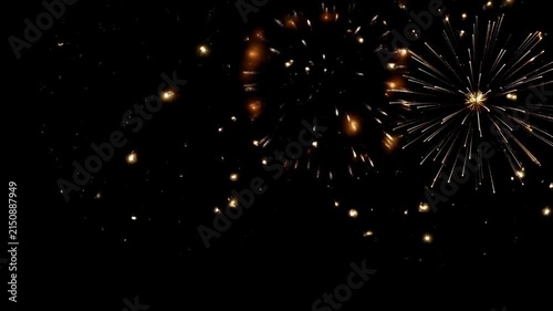 Golden firework display bursting over dark night sky with sparkling golden burst sky display