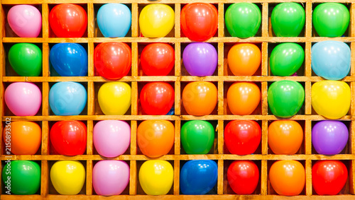 Obraz na płótnie Balloon shooting gallery. Bright balls standing in a row