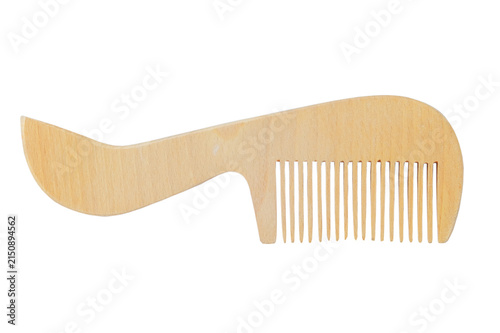 Wooden hair comb isolated on white background. Handcrafted wooden comb. Hair accessory. Personal care. Eco friendly and handcrafted accessory.