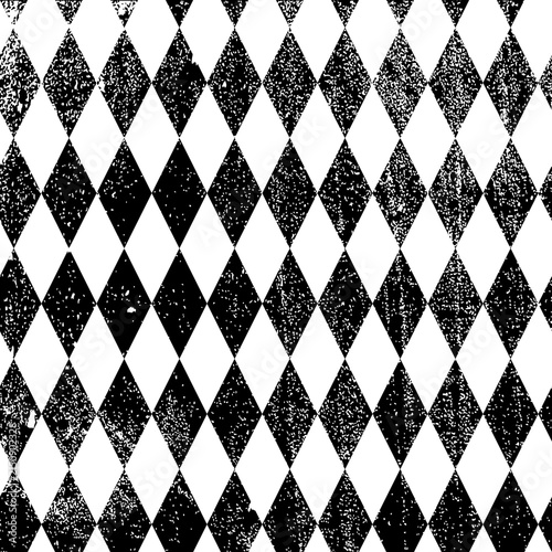 black and white harlequin diamond pattern with grunge texture