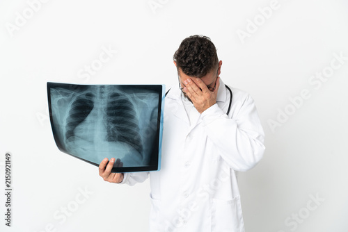 Professional traumatologist isolated on white background with tired and sick expression