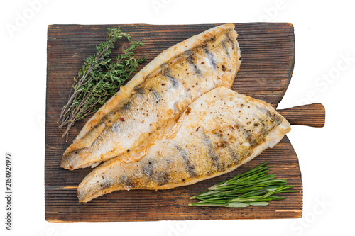 Canvas Print Golden seared freshwater fish fillets with garlic cloves and thyme, homemade gourmet dinner