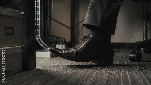 Close-Up of Elegant Business Shoe in Modern Office Setting