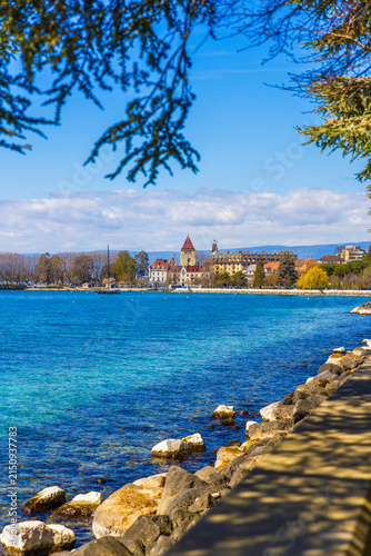 Obraz na płótnie Lake Geneva shoreline with sunny Lausanne view, Switzerland