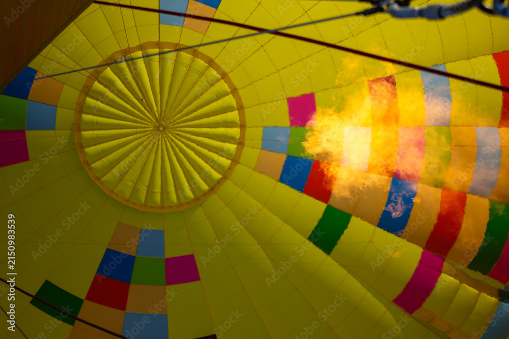 Fototapeta premium Close up inside view of gas burner flame inflating hot air balloon.