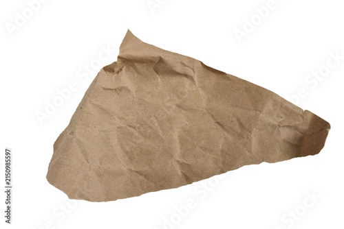A crumpled piece of brown kraft paper with torn edges on a white background.