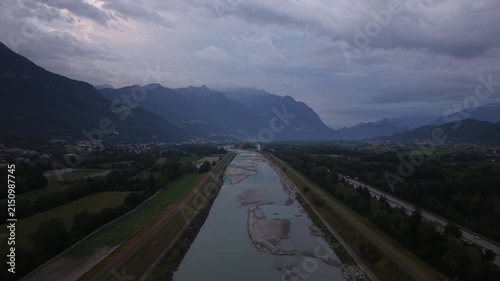 Forward drone flight above the Rhine River during unusually low water conditions, revealing extensive exposed sandbanks and shallow areas along the river.