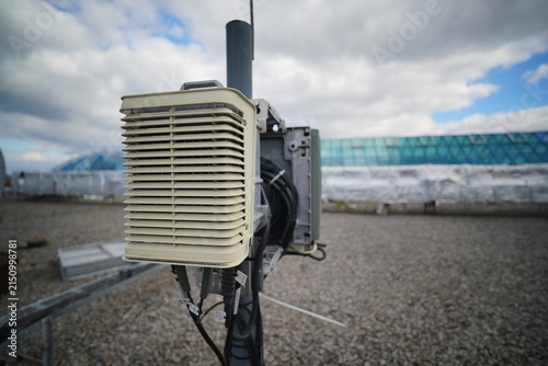 Canvastavla Outdoor telecommunication equipment radio unit with cooling gills on rooftop