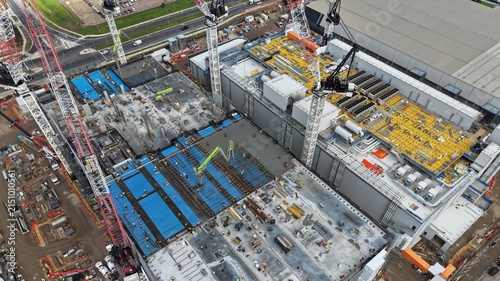 Large data centre industrial facility building constructing process aerial view