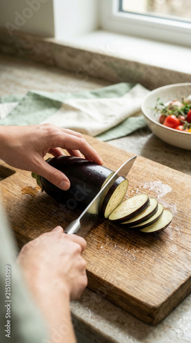 Fresh Eggplant Sliced On A Wooden Cutting Board For Cooking