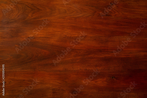 Top view of empty dark brown walnut mahogany wood grain texture background with vintage rustic pattern