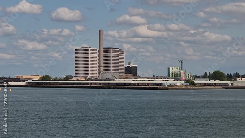 Dolly View of Industrial Harbor Terminals and Rotterdam Skyline