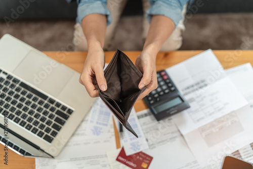 Konstfotografi Bankruptcy problem financial concept, Young man opening empty wallet stress to f