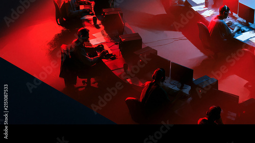 Awareness poster about scam call centers, several ordinary looking operators with headsets working in a cramped low budget room, not glamorous, not cyberpunk, no hoodies, the