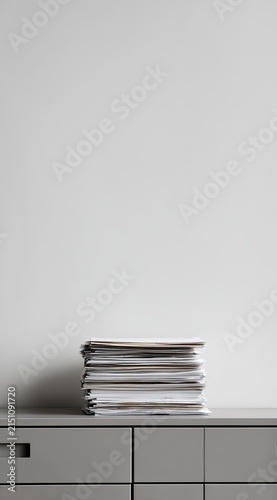 Stack of Paperwork on Office Cabinet for Organization
