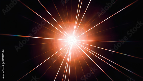 Intense Glowing Light Source with Bright Orange Halo and Radial Beams on Black Background