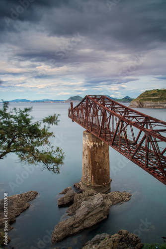 Obraz na płótnie Historic Dicido ore loading pier in Castro Urdiales Cantabria with rusty iron st