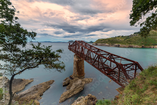 Quadro su tela Historic Dicido ore loading pier in Castro Urdiales Cantabria with rusty iron st