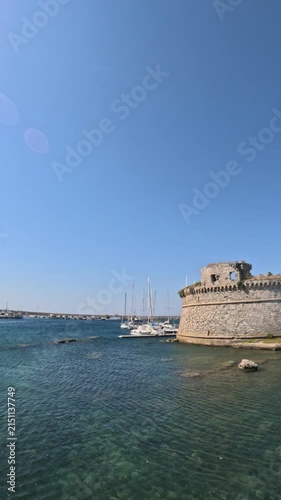 Gallipoli castle and harbor on sunny day in puglia italy