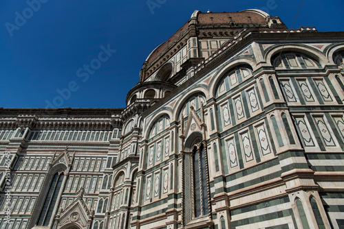 The landmark cathedral of santa maria del fiore on a blue sky sunny day in Florence italy