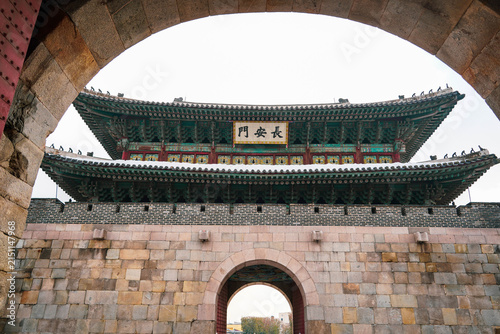 Janganmun Gate framed through stone archway Suwon