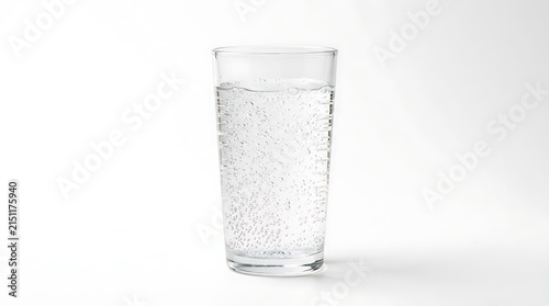 A refreshing glass of sparkling water on a white background.