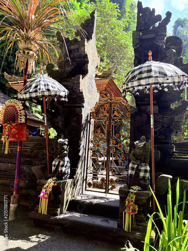  backdrop of lush greenery and traditional architecture in Bali