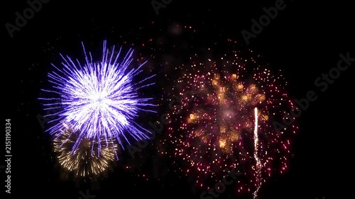 Multiple Purple and Multi-Color Fireworks Displays on Isolated Transparent Background. Perfect for Happy New Year, Merry Christmas, Independence Day, Veterans Day.