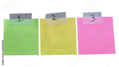 Fotografie Three colorful sticky notes with numbers one two and three written on them attac