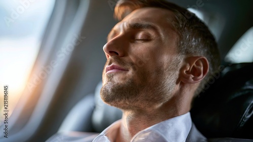 Man rests peacefully in airplane seat