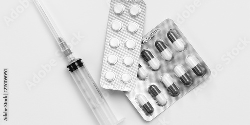 Syringe and Pill Blister Pack Black and White Medical Photo