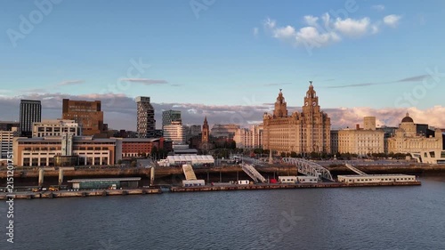 Panoramic view of the Liverpool waterfront and Royal Liver Building during sunset