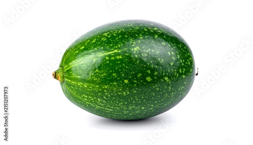 Fresh green avocado whole fruit closeup.