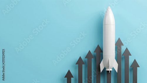 Conceptual model rocket launching over black ascending growth arrows on blue