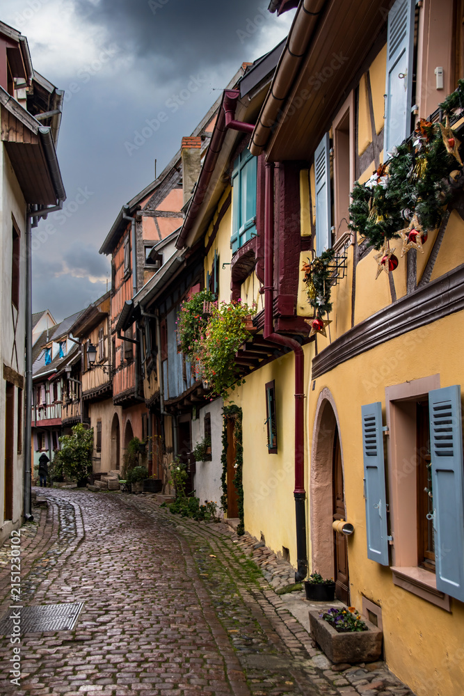 Fototapeta premium Walking through the village of Eguisheim (Alsace-France)