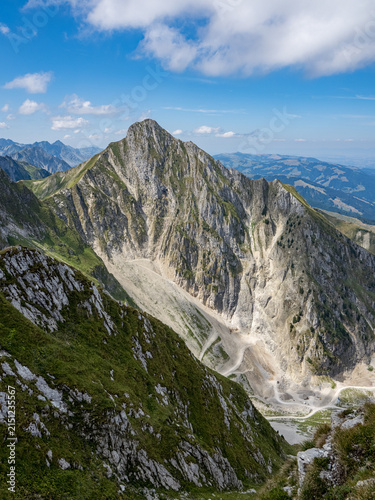 Bild auf Leinwand Jagged limestone peak and alpine cirque in Bernese Oberland - panoramic alpine s