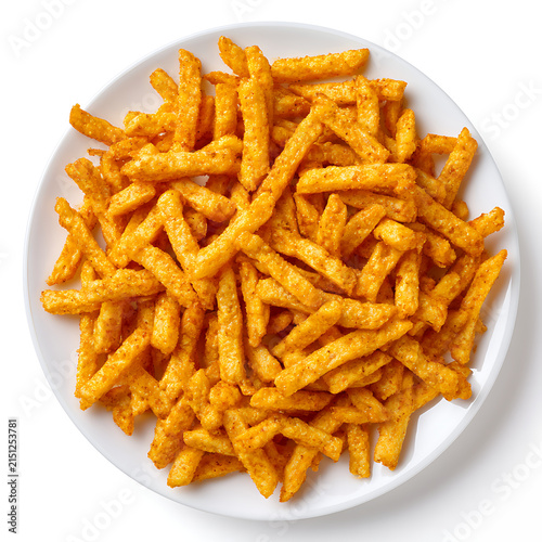 Crunchy cheese corn stick snacks on a white plate