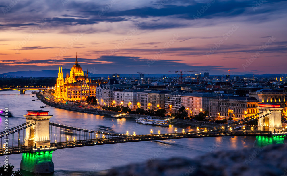 Fototapeta premium Hungarian parliament building and Danube river at sunset, Budapest, Hungary