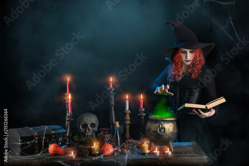 Obraz na płótnie Witch casts spell, cauldron, boiling magic potion, candles