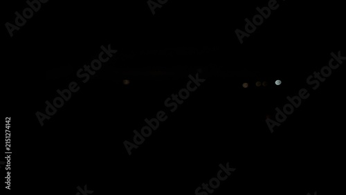 Fotografie Black Screen with White Dots Emitting Light
