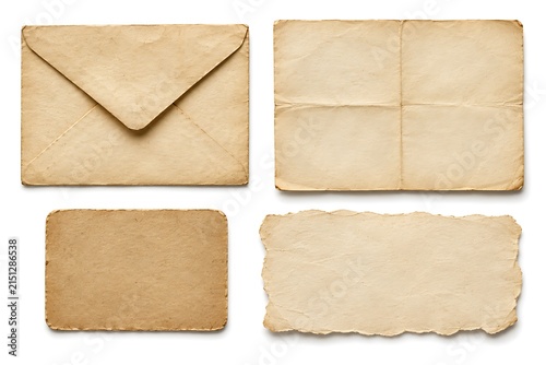 Фотография Vintage paper assortment including envelope, folded paper, and textured sheets for nostalgic themes